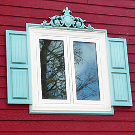 aqua blue shutters with bead board wainscot look and aqua window pediment