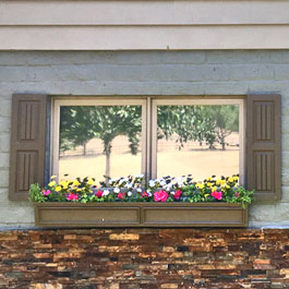 Brown Flower Box and Raised Wainscot Outdoor Shutters