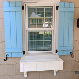 Baby Blue Board and Batten Shutters and Window Box