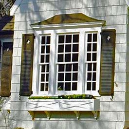 custom window box with x pattern on front with louver diamond cutout shutters